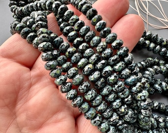 Gorgeous Czech glass faceted rondelles. Picasso finish! Sold per strand of 25 beads. SKU 16604