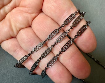 Gorgeous gunmetal plated filigree link chain! Sold per yard. SKU chain340