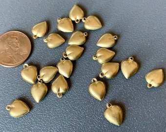 Vintage puffy brass heart charms! Sold per lot of ten heart charms.  SKU 04906