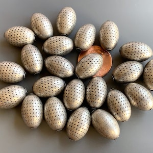 Incredible quality, American made brass beads! Etched, incised and silver oxidized! Beautiful!