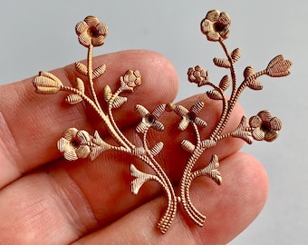 Very unusual finish on these vintage, new old stock stampings! Like a light honey rose gold taupe. Unusual! Sold per piece. SKU 08701