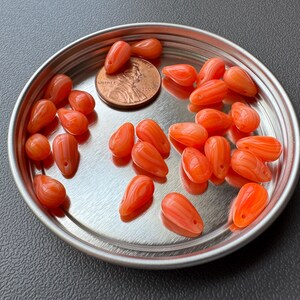 Gorgeous gorgeous gorgeous color in these Czech pressed glass drops! Sold per 25 beads. SKU 14902