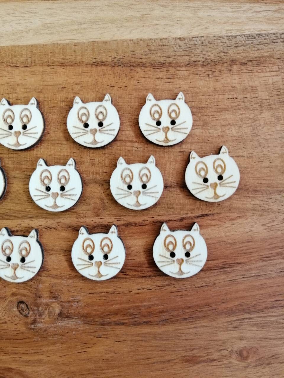 cat buttons sewing