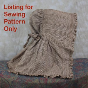 May include: A brown and white gingham bonnet with a ruffled edge and a side tie closure. The text Listing for Sewing Pattern Only is printed in red on the left side of the image. The bonnet features a gathered crown and a wide brim.