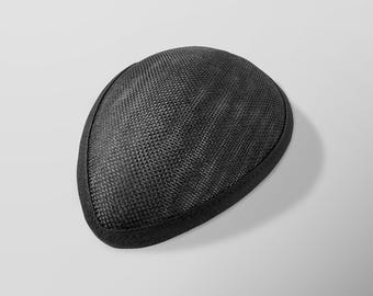 May include: A black, oval hat with a woven texture. The hat features a solid black trim around the edge. The hat is entirely black in colour.