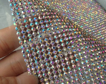 Rhinestone mesh Best quality sparkly  Iron on. Very easy to cut and will not come apart. Perfect for apparel, costume, jewelry, banding