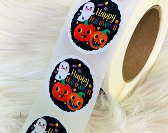 May include: Roll of round stickers with a black background, a white ghost, two orange pumpkins, and the text "Happy Halloween" in rainbow letters.