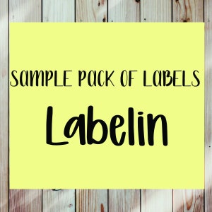 May include: A yellow background with black text that reads "SAMPLE PACK OF LABELS" and "Labelin".