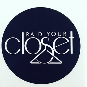 May include: A navy blue circle with the text "RAID YOUR CLOSET" in white. The "S" in closet is a stylized hanger.
