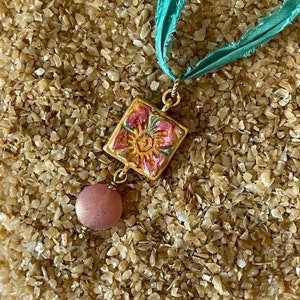Gold Plated Embossed Floral Hand-Painted Pendant with Sari Ribbon and Czech Bead Dangle