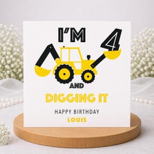 May include: A square white birthday card featuring a yellow and black construction excavator graphic. The text reads I'M 4 AND DIGGING IT, HAPPY BIRTHDAY, and the name LOUIS in yellow. The design uses bold black and yellow typography on a white background.