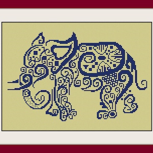 May include: Cross-stitch artwork of an elephant in a frame. The elephant is navy blue, with intricate patterns and swirls, set against a light yellow background. The frame is white with a dark red border.