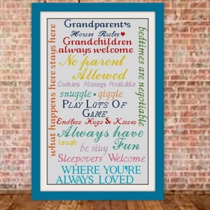 May include: A framed print with a teal border, featuring colorful text on a white background. The text includes phrases like "Grandparent's House Rules," "Grandchildren always welcome," and "Where you're always loved."