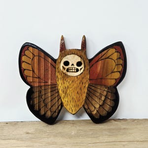 Houtdecoratie kleine doodsmot