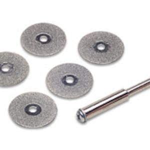 May include: Set of five small diamond-coated grinding wheels with a silver metal mandrel. The wheels are silver and gray.