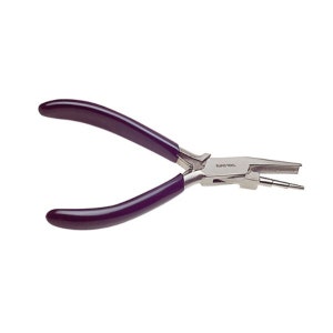 May include: A pair of silver-toned pliers with purple rubber handles. The pliers have a small, interchangeable head with a pin and a small, round, metal piece. The pliers are labeled "Euro Tool."
