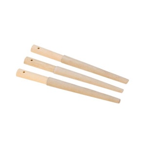 May include: Three wooden sanding sticks with a tapered shape and a beige sanding surface.