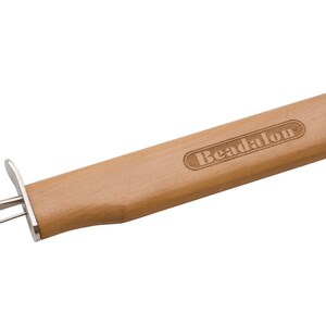 May include: A wooden beading tool with a metal tip and a wooden handle. The handle is engraved with the word "Beadalon".