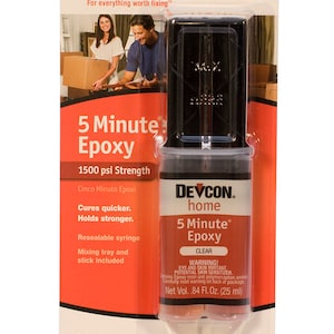 May include: A clear plastic tube of DEVCON home 5 Minute Epoxy adhesive with a red and white label. The label says "Cures quicker. Holds stronger." and "1500 psi Strength". The tube is packaged in a clear plastic pouch with a red and white label that says "DEVCON home 5 Minute Epoxy CLEAR". The label also includes a warning about eye and skin irritation and a net volume of 0.84 fluid ounces (25 ml).