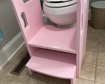 Get up and GO Potty Helper Two-Step Stool. Has  4 handles for ease of use. Sturdy and SAFE, glued and screwed. Fits your toilet! - PINK