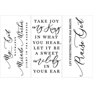 May include: Three black and white signs with inspirational quotes about faith and praise. The first sign says "My God Waymaker Miracle Worker Light in the Darkness". The second sign says "Take Joy My King In What You Hear. Let It Be A Sweet Melody In Your Ear". The third sign says "Let Everything That Has Breath Praise God".