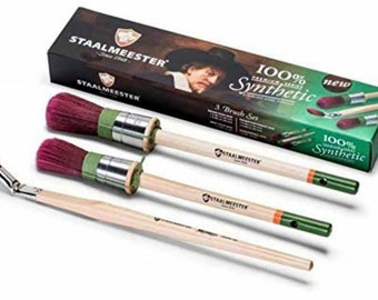 May include: A set of three paint brushes with wooden handles and synthetic bristles. The brushes are labeled "Staalmeester" and are 100% synthetic. The brushes are packaged in a box with a portrait of a man on the front.