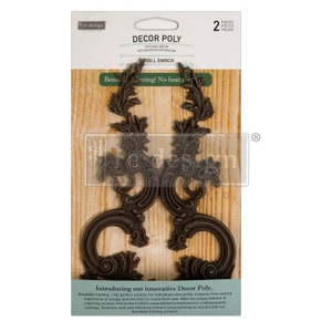 May include: Two dark brown Decor Poly scroll enrich appliques. The appliques have an ornate, curved design with leaf and scroll details. The packaging includes the text "Bendable Casting! No heat required."
