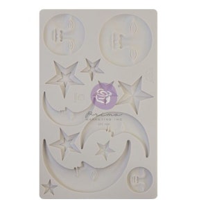 May include: Silicone mold with 10 different shapes, including crescent moons, stars, and faces. The mold is white and has the text "Prima Marketing Inc. Est. 1993" on it.