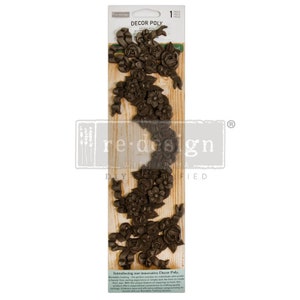 May include: A package of brown, decorative poly resin floral molding. The package is labeled "Decor Poly" and "re-design".