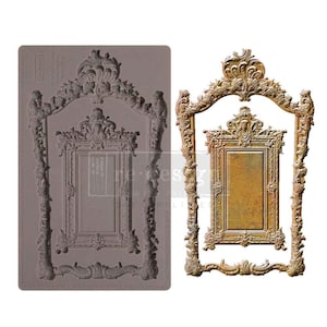 May include: An ornate, antique-style frame in a bronze finish, with intricate scrollwork and a rectangular center. Next to it is a gray silicone mold of the same frame, ready for crafting. The design is reminiscent of vintage decor.