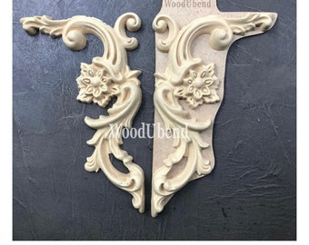 May include: A set of two unfinished wood corner appliques with a floral design. The appliques are labeled "WoodUbend #6025".