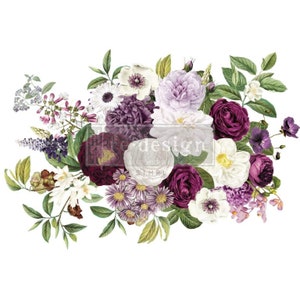 May include: A bouquet of purple, white, and green flowers. The bouquet includes roses, peonies, and other blooms. The flowers are arranged in a loose, natural style.