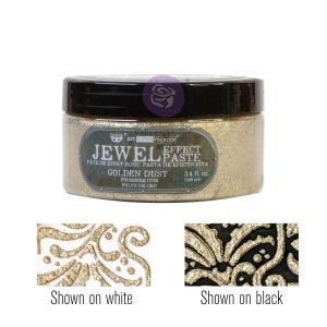 May include: A jar of Golden Dust Jewel Effect Paste by Art Anthology. The label reads "Pâte de Effet Bijou, Pasta de Efecto Joya, Poussière d'Or, Polvo de Oro". The jar contains 3.4 fl oz (100 ml) of golden paste. Two samples show the paste on white and black surfaces.