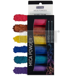 May include: A set of six mica powder samples in a rainbow of colors, including red, orange, yellow, blue, teal, and purple. The mica powder is packaged in a black box with the text "re-design with prima" and "mica powder" printed on it.