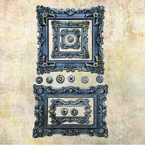 May include: A set of four ornate, blue-grey metal picture frames with intricate details. The frames are arranged in a stack, with the largest frame at the bottom and the smallest frame at the top. Each frame has a decorative border and a small, round knob in the center.