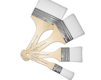 May include: Set of four paint brushes with wooden handles and white bristles. The brushes are labeled "Fusion Mineral Paint" and "paint beautiful".