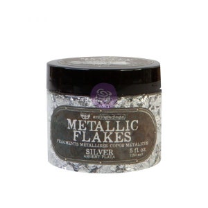 May include: A jar of silver metallic flakes for crafts. The jar has a black lid and a label with the words "METALLIC FLAKES" and "SILVER". The jar contains 5 fl. oz. (150 ml) of flakes.