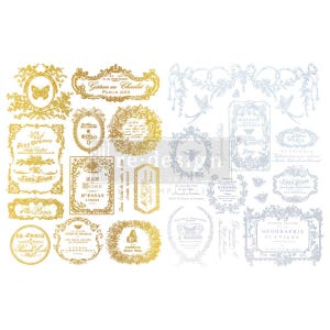 May include: A collection of gold and silver decorative labels and frames with floral and butterfly designs. Some labels include text such as "Paris 1889", "Seed Catalogue", and "Eau Rose". The design elements are vintage and elegant.