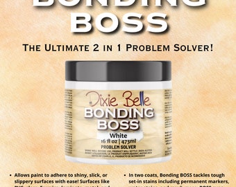 May include: A white jar of Dixie Belle Bonding Boss paint, a 2-in-1 problem solver. The jar is labeled "Bonding Boss White" and "16 fl oz | 473ml Problem Solver".