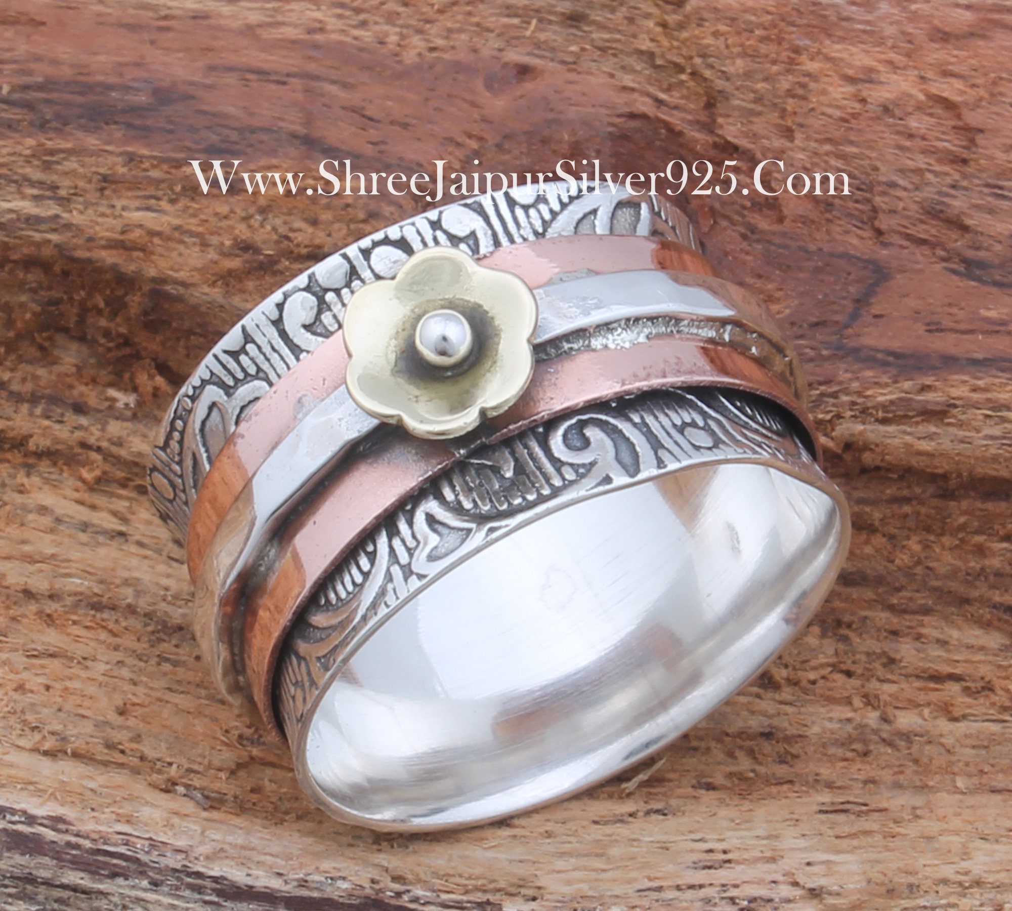 花の刻印入りスターリングシルバースピナーリング - ツートンフィ 