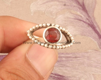Sterling Silver Evil Eye Ring: Round Blue Topaz Gemstone