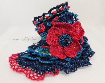Crochet Cuff Bracelet in blue and red with beads and flowers