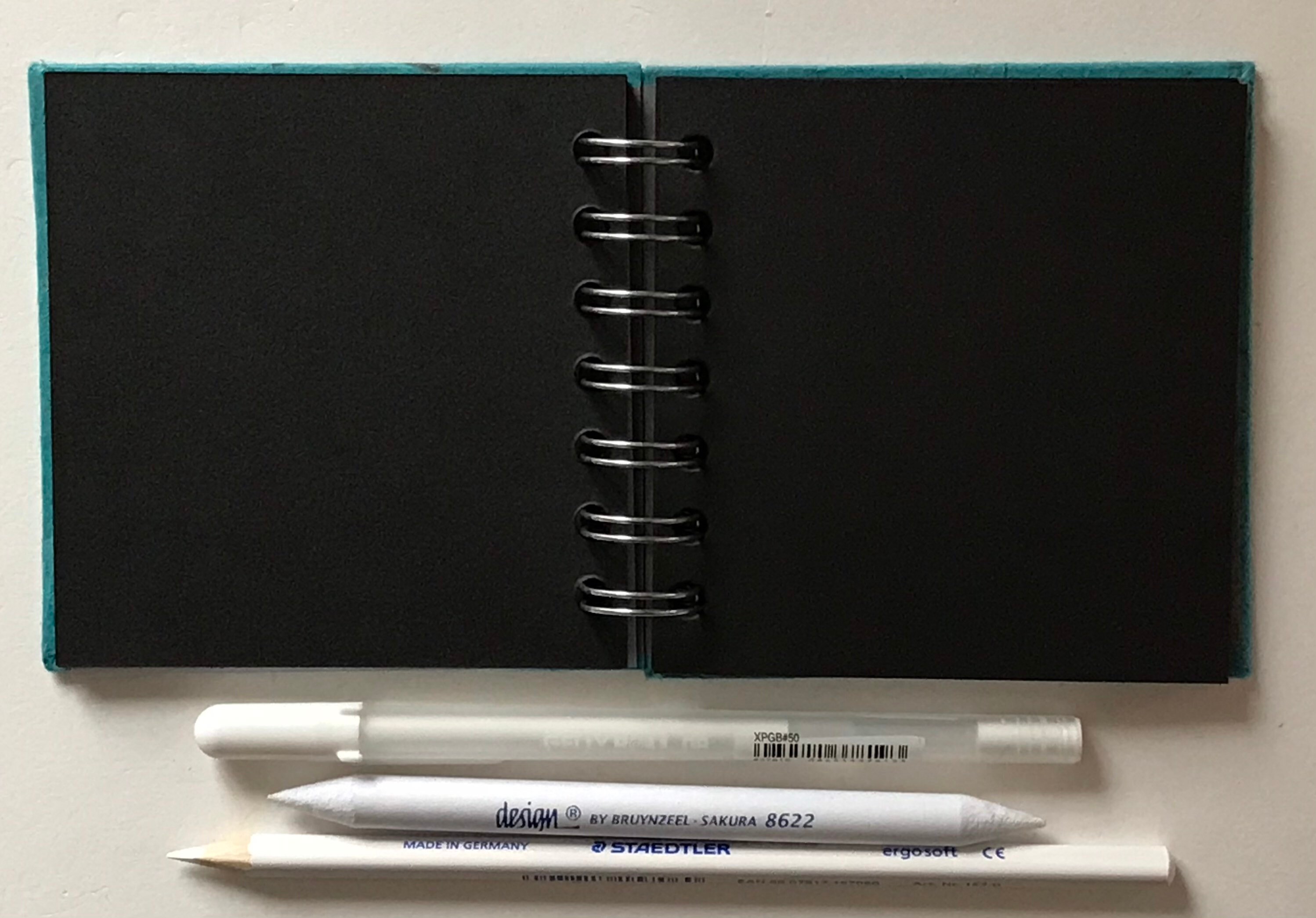 4x4” Square Wire Bound Sketchbook With Black Paper, White 4x4” Square Wire Bound Sketchbook With Black Paper, White