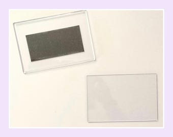 1 large clear plastic magnet -  rectangle 6x4”