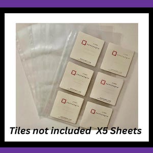 May include: Clear plastic sheets and six square cards with a red square logo and the text "zentangle.com". The text "Tiles not included X5 Sheets" is at the bottom of the image.