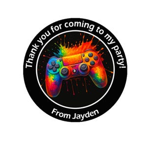 May include: A circular sticker with a vibrant rainbow-coloured games controller at the centre. The text "Thank you for coming to my party!" is printed around the edge, with "From Jayden" at the bottom.