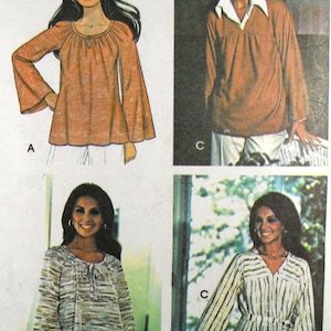 May include: A vintage sewing pattern featuring four different styles of blouses. The pattern includes a long-sleeved blouse with a tie at the neck, a long-sleeved blouse with a collar, a long-sleeved blouse with a tie at the neck and a striped pattern, and a long-sleeved blouse with a tie at the neck and a striped pattern with a belt.