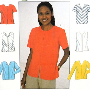 May include: A sewing pattern envelope featuring a central photograph of a person wearing a short-sleeved orange top with a round neckline and a front slit. Surrounding the photo are six technical line drawings of tops in various colors and patterns.