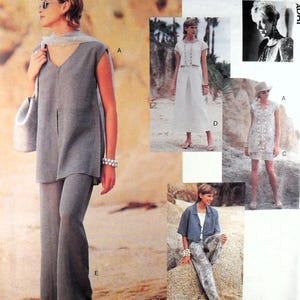 May include: A sewing pattern envelope featuring various garment designs including a grey V-neck tunic with matching wide-leg trousers, a white two-piece set with a skirt, a button-front dress, and a cropped jacket with patterned trousers.