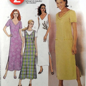 May include: A sewing pattern envelope for a 2 Hour Dress or Jumper featuring illustrations of four variations. The designs include a floral purple dress, a plaid jumper over a white shirt, a white dress with floral detail, and a solid gold dress.